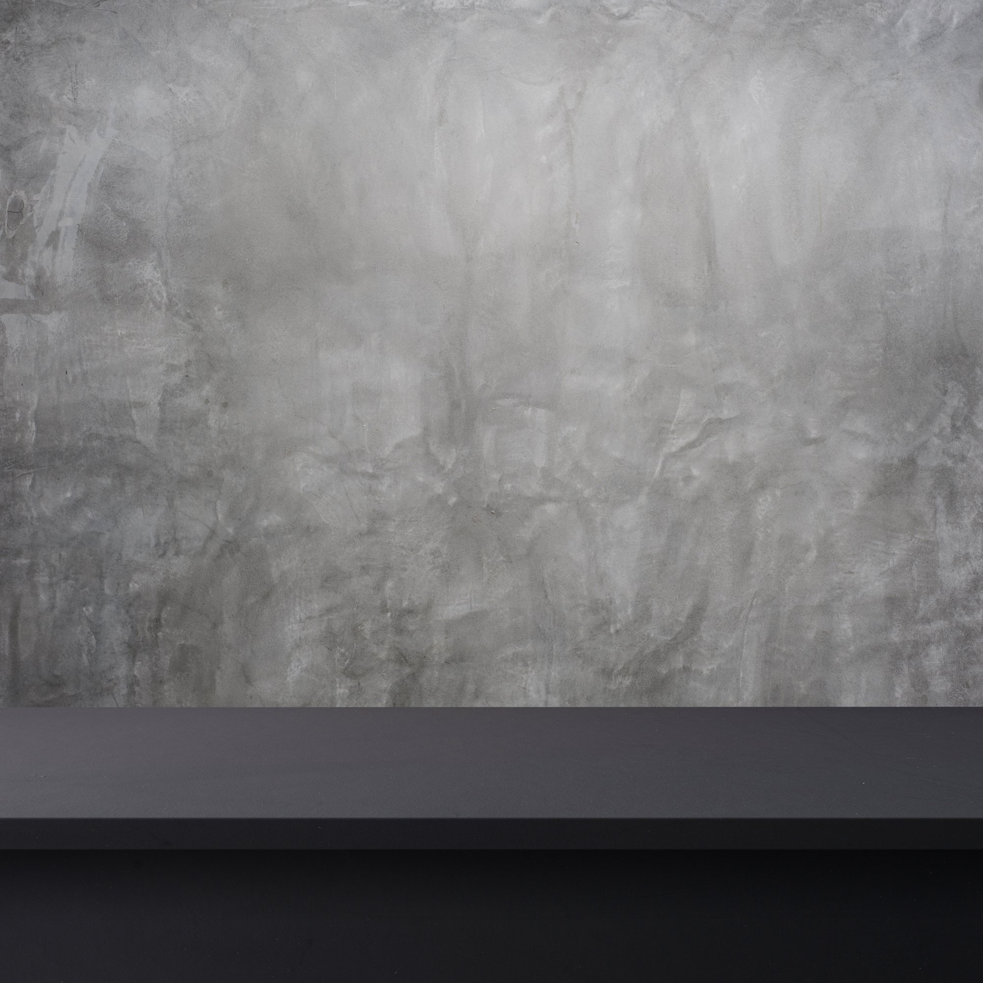 Black Table against Cement Background 